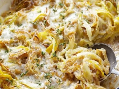 Delicious French Onion Zucchini Bake fresh out of the oven, garnished and ready to serve.