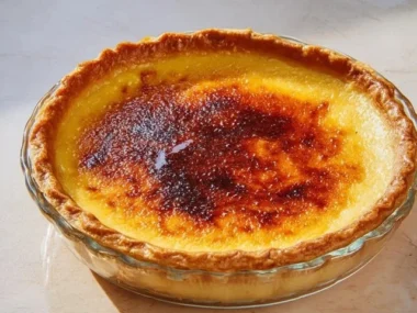 Delicious Creme Brulee Pie with caramelized sugar topping and custard filling