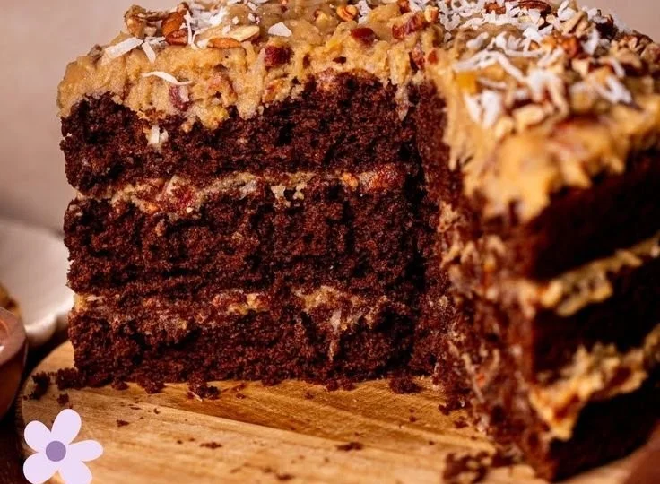 Delicious slice of German Chocolate Cake with coconut-pecan frosting