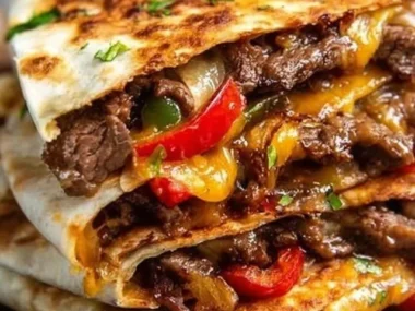 Delicious Steak Fajita Quesadillas filled with seasoned steak and colorful vegetables.