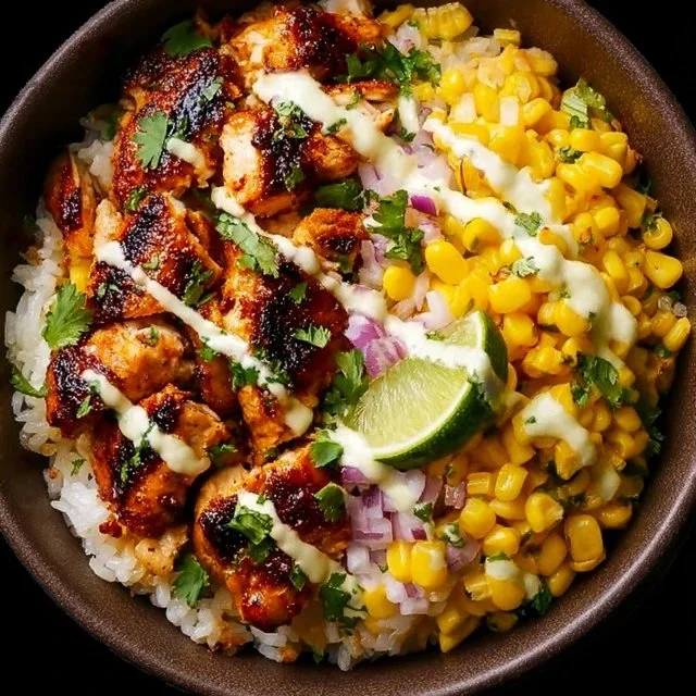 Delicious Street Corn Chicken Rice Bowl with fresh ingredients and vibrant toppings.