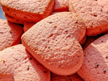 Delicious strawberry yogurt heart biscuits for dogs, perfect for Valentine's Day