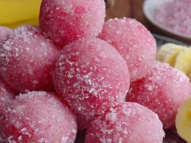 Wholesome strawberry banana frozen balls for dogs served in a bowl