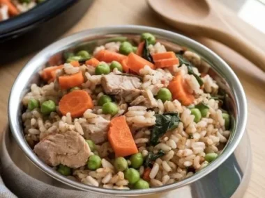 Bowl of homemade dog food made with fresh ingredients for a healthy pet diet.
