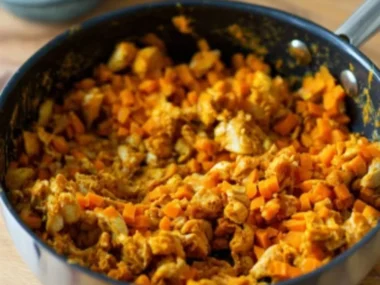 DIY chicken sweet potato dog food recipe for happy and healthy dogs.