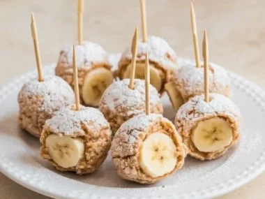 Frozen peanut butter banana bites served on a plate