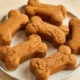 Frozen pumpkin dog treats in fun bone-shaped molds
