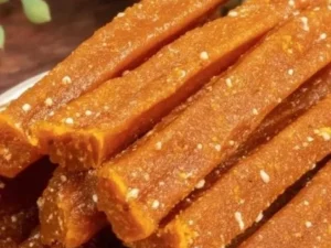 Healthy carrot pumpkin chews for dogs, perfect for training or treating.