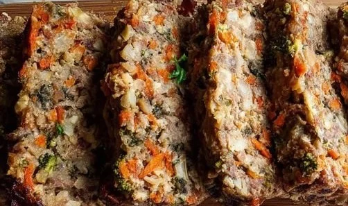 Bowl of homemade dog food made with fresh ingredients