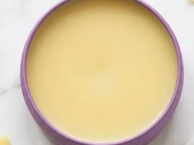 Homemade dog paw balm in a jar, designed to nourish and protect dog paws.