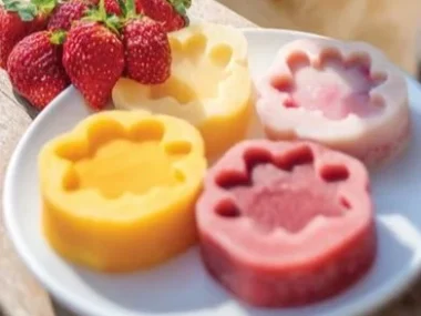 Mango and Strawberry Frozen Dog Treats in a bowl for pets