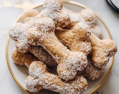 A variety of homemade no-bake dog treats in a bowl