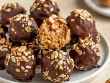 A bowl of nutritious peanut butter oat balls, a healthy snack option.