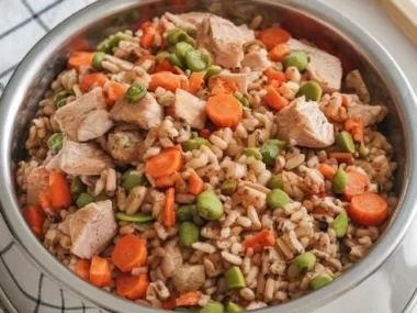 Bowl of balanced dog food with fresh ingredients for healthy pets