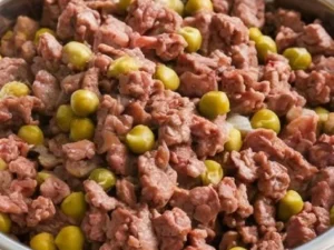 Homemade beef and pea dog food recipe for a healthy pet meal.