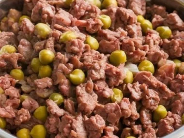 Homemade beef and pea dog food recipe for a healthy pet meal.