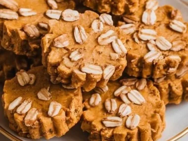 A plate of no-bake peanut butter pumpkin dog treats for pets.