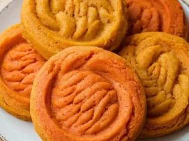 Homemade pumpkin and carrot dog cookies fresh out of the oven
