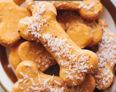 Homemade Sweet Potato Dog Treats in a bowl with a paw print design