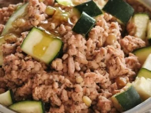 Turkey and zucchini dog dinner served in a bowl for pets