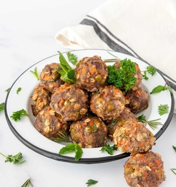 Homemade bison meatballs for dogs, a healthy dog treat alternative.