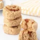 Freshly baked cinnamon roll dog treats on a wooden table