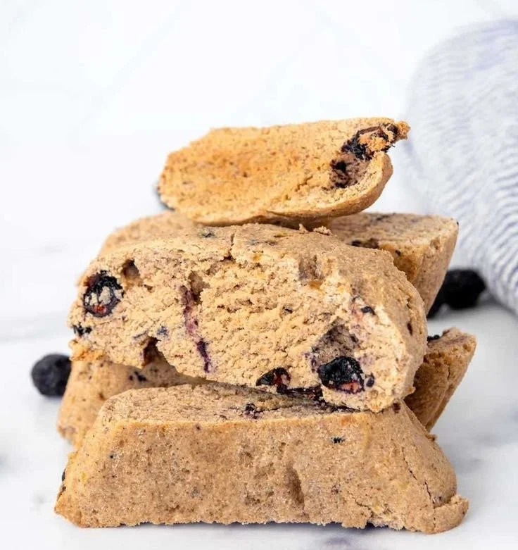 Homemade dog biscotti treats in a decorative bowl