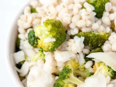 Bowl of homemade dog food featuring fish and fresh ingredients