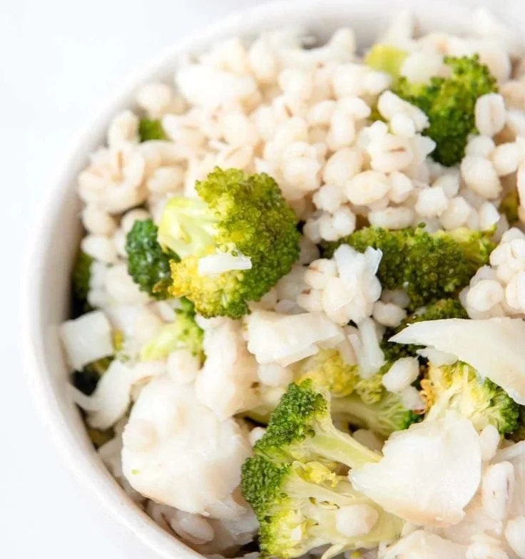 Bowl of homemade dog food featuring fish and fresh ingredients
