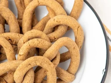 Dog enjoying a safe, homemade pretzel treat