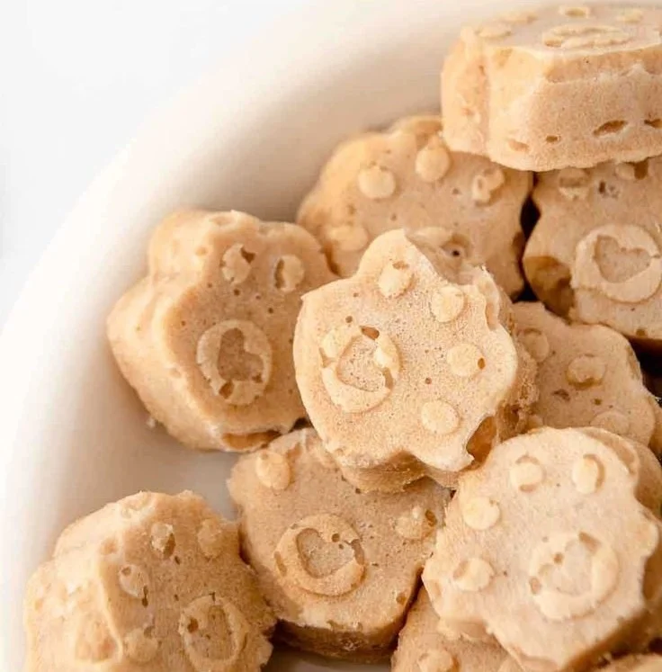 A bag of Tuna Dog Treats for dogs, promoting healthy and tasty rewards.